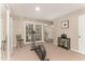 Large exercise room featuring an elliptical machine and access to both a bathroom and outdoor patio at 197 Country Routt Brown Rd, Pittsboro, NC 27312