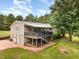 Charming home featuring a brick paved driveway, attached garage, and an expansive porch perfect for relaxing at 197 Country Routt Brown Rd, Pittsboro, NC 27312
