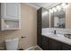 Neutral bathroom with great lighting and cabinet storage at 1993 Lucy Garrett Rd, Roxboro, NC 27574