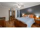 Well-lit bedroom with hardwood floors and neutral walls at 1993 Lucy Garrett Rd, Roxboro, NC 27574