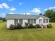 Attractive single-story home with a well-kept front yard and a clean, classic exterior at 1993 Lucy Garrett Rd, Roxboro, NC 27574