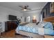Spacious main bedroom with hardwood floors and closet space at 1993 Lucy Garrett Rd, Roxboro, NC 27574