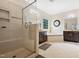 Bright bathroom with separate shower and soaking tub, offering a spa-like experience at 200 Vintage Hill Cir, Apex, NC 27539