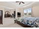 Spacious main bedroom suite with sitting area, large windows, and plush carpeting at 200 Vintage Hill Cir, Apex, NC 27539