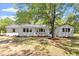 Beautiful single story home boasts new paint, new landscaping, updated fixtures and charming curb appeal at 2003 Broadway Rd, Sanford, NC 27332