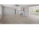 Open living area featuring wood floors, neutral walls, and a cozy fireplace, creating a warm and inviting atmosphere at 2003 Broadway Rd, Sanford, NC 27332