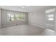 Light filled room with light colored flooring, fresh paint, recessed lights, and natural light at 2003 Broadway Rd, Sanford, NC 27332