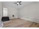 Spacious basement with modern floors and a ceiling fan at 208 Essex Rd, Nashville, NC 27856