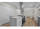 Modern kitchen with granite countertops, stainless appliances, eat-in bar, and lots of cabinet space at 208 Essex Rd, Nashville, NC 27856