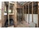 Bathroom under construction with shower stall, insulation, plumbing, electrical, and wood framing at 2236 The Cir, Raleigh, NC 27608