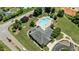 This aerial shows a community pool and seating in a well maintained neighborhood at 230 Paddy Ln, Youngsville, NC 27596