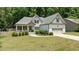 Charming single-Gathering home with a landscaped front yard and welcoming two-car garage at 230 Paddy Ln, Youngsville, NC 27596