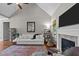 Inviting living room with vaulted ceiling, fireplace, and open layout perfect for entertaining at 230 Paddy Ln, Youngsville, NC 27596
