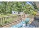Relax on this back deck with two chairs and views of the yard at 2616 Kirk Rd, Durham, NC 27705