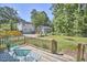 Back deck provides scenic views of the yard and detached garage/shed at 2616 Kirk Rd, Durham, NC 27705