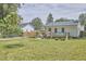 A view of the backyard showing a deck and partial fencing at 2616 Kirk Rd, Durham, NC 27705