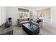 Comfortable living room featuring a large sectional couch, decorative lighting, and a large window at 2802 Kempthorne Rd # 64, Cary, NC 27519