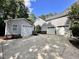 Spacious driveway leading to attached and detached garages with ample parking at 2934 Appaloosa Ct, Graham, NC 27253