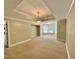 Spacious living room with neutral walls, plush carpet, and ample sunlight at 2934 Appaloosa Ct, Graham, NC 27253