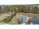 Drone view of home with a view of wooden bridge and walking trail at 3020 Mavisbank Cir, Apex, NC 27502