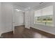 Versatile office space featuring hardwood floors, recessed lighting, and French doors, creating a flexible area at 3020 Mavisbank Cir, Apex, NC 27502