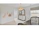 This Bedroom features a crib, dresser with mirror, and window that creates a serene and inviting space at 304 Avery Glenn Way, Fuquay Varina, NC 27526