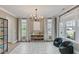 Versatile bonus room featuring plush seating, natural light and ample space at 304 Avery Glenn Way, Fuquay Varina, NC 27526