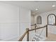 Bright hallway with beautiful woodwork, natural light, and elegant decor at 304 Avery Glenn Way, Fuquay Varina, NC 27526