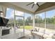 Relax on the screened porch with comfortable seating overlooking a spacious backyard, perfect for outdoor gatherings and leisure at 304 Avery Glenn Way, Fuquay Varina, NC 27526