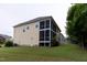 Expansive backyard featuring a two-story screened porch, ideal for outdoor relaxation and entertaining at 317 Springhurst Ln, Cary, NC 27511