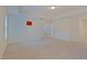 Large bedroom with carpet, white walls, recessed lights, and an open doorway at 317 Springhurst Ln, Cary, NC 27511
