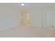 Spacious bedroom features neutral carpet with closet and bathroom access at 317 Springhurst Ln, Cary, NC 27511