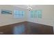 Dining room featuring custom trim work on the walls, hardwood floors and views of backyard at 317 Springhurst Ln, Cary, NC 27511