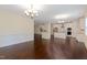 Spacious open-concept floorplan that connects living, dining, and kitchen areas with hardwood floors at 317 Springhurst Ln, Cary, NC 27511