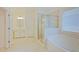 Relaxing main bathroom with a soaking tub, stand-up shower, double vanity, and tiled floors at 317 Springhurst Ln, Cary, NC 27511