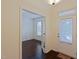 Office space with French doors, hardwood flooring, and a view to the front door at 317 Springhurst Ln, Cary, NC 27511