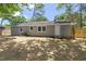 An expansive backyard, enclosed by a privacy fence, offers ample space for outdoor activities at 3204 Winfield Ct, Raleigh, NC 27610