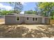 Open backyard featuring freshly laid straw and a privacy fence, great for entertaining at 3204 Winfield Ct, Raleigh, NC 27610