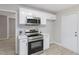 Modern kitchen features stainless steel appliances, subway tile backsplash, and quartz countertops at 3204 Winfield Ct, Raleigh, NC 27610