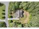 Birds eye view of home showing roof, patio and driveway at 344 Colonial Ridge Dr, Pittsboro, NC 27312