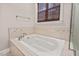 Close-up view of a soaking tub in a well-lit bathroom at 344 Colonial Ridge Dr, Pittsboro, NC 27312