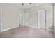 Bedroom showcasing multiple closets and access to the en-suite bathroom at 344 Colonial Ridge Dr, Pittsboro, NC 27312