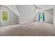 Large bonus room with neutral carpeting and large windows at 344 Colonial Ridge Dr, Pittsboro, NC 27312