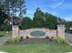 Stone entrance showing 'The Estates at Chapel Ridge' community at 344 Colonial Ridge Dr, Pittsboro, NC 27312