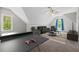 Game room with ping pong table, sofa, recliners, and ceiling fan at 344 Colonial Ridge Dr, Pittsboro, NC 27312