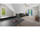 Game room with ping pong table, sofa, recliners, and ceiling fan at 344 Colonial Ridge Dr, Pittsboro, NC 27312