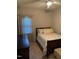 Cozy bedroom with natural light, a comfortable bed, and a 'welcome' throw pillow at 352 Riverstone Dr, Clayton, NC 27527