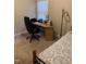 Bedroom featuring a desk, chair, bed and a ring light near the window at 352 Riverstone Dr, Clayton, NC 27527