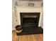 Close-up of the fireplace with decorative mantel at 352 Riverstone Dr, Clayton, NC 27527