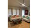 Bright living room with hardwood floors, modern decor, and ample seating at 352 Riverstone Dr, Clayton, NC 27527